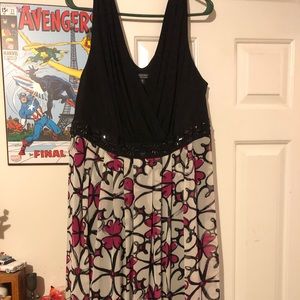 Flirty sleeveless beaded heart dress